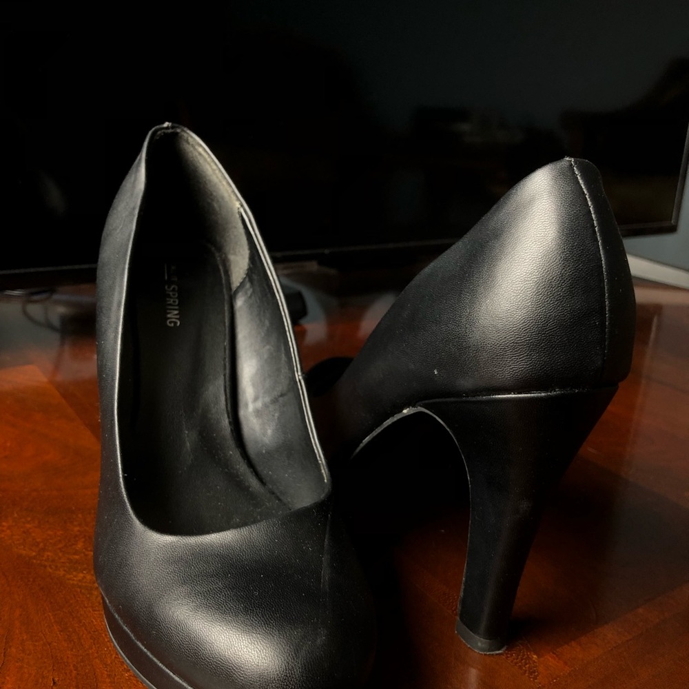 Two pairs Spring heels